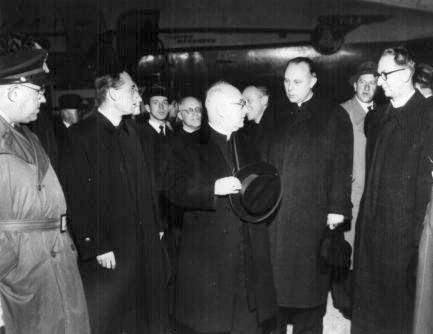 1953 October 21  New York  Cardinal Spellman on the ramp  at Vienna Austria.